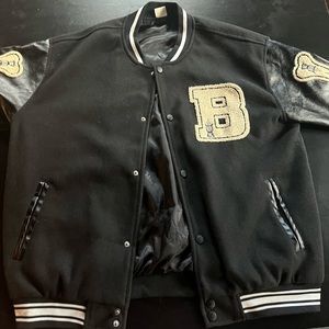Black leather varsity jacket